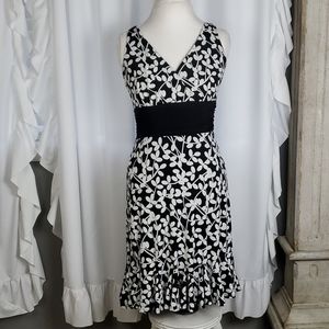 White House Black Market white and black floral sleeveless dress in size Small